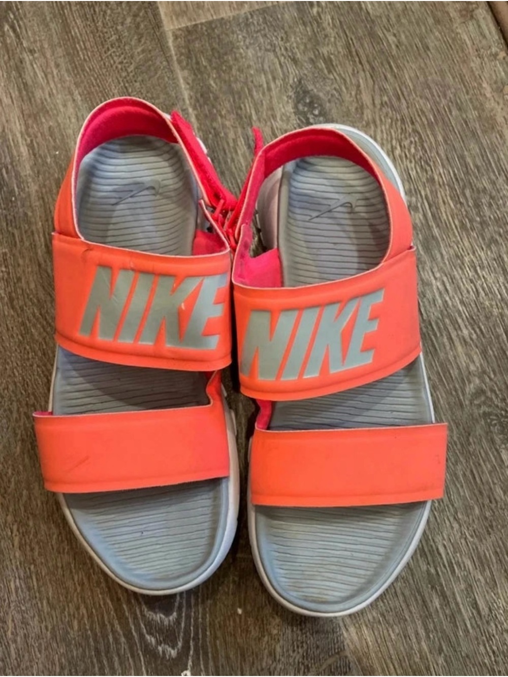 Nike women’s Coral-Orange Hook-and-Loop Slide Sandals